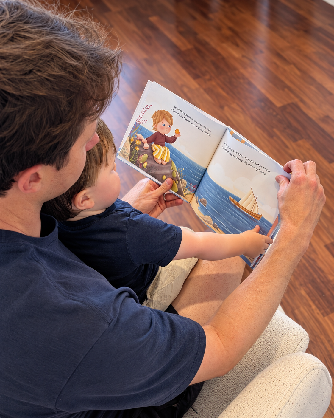 An adult and child reading Life Explorer together